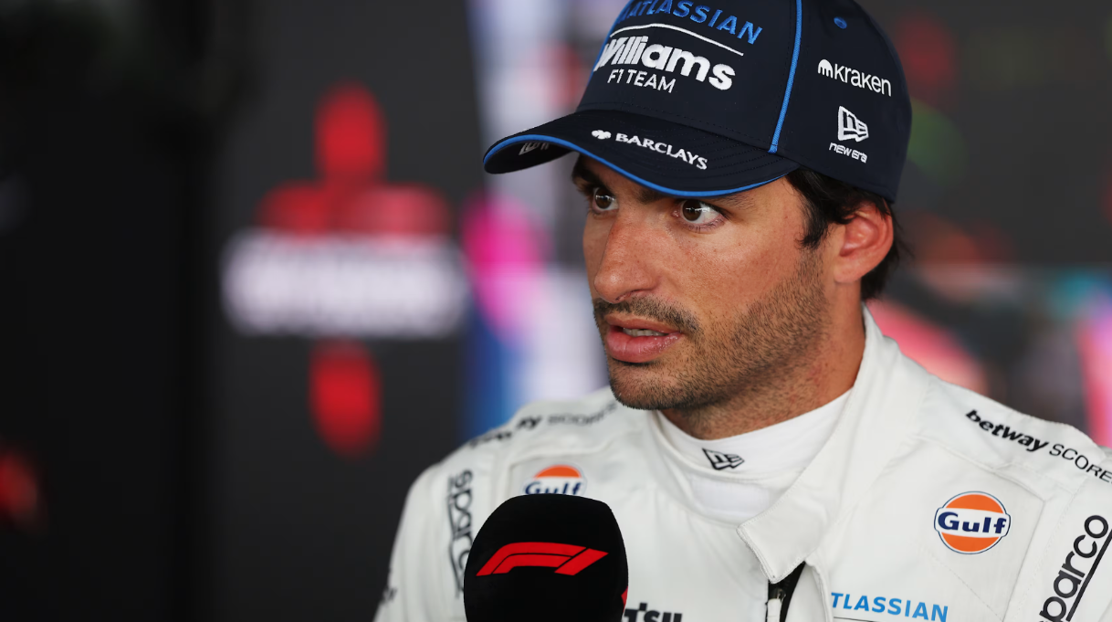 Racing drivers exploring the Formula E paddock and team areas
