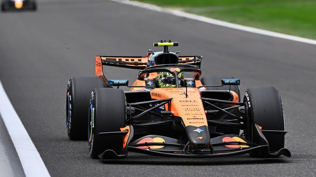 A McLaren Formula 1 car runs alone on the circuit