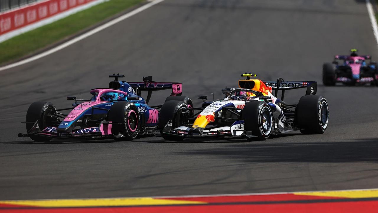 Alpine and Red Bull Formula 1 cars race side by side