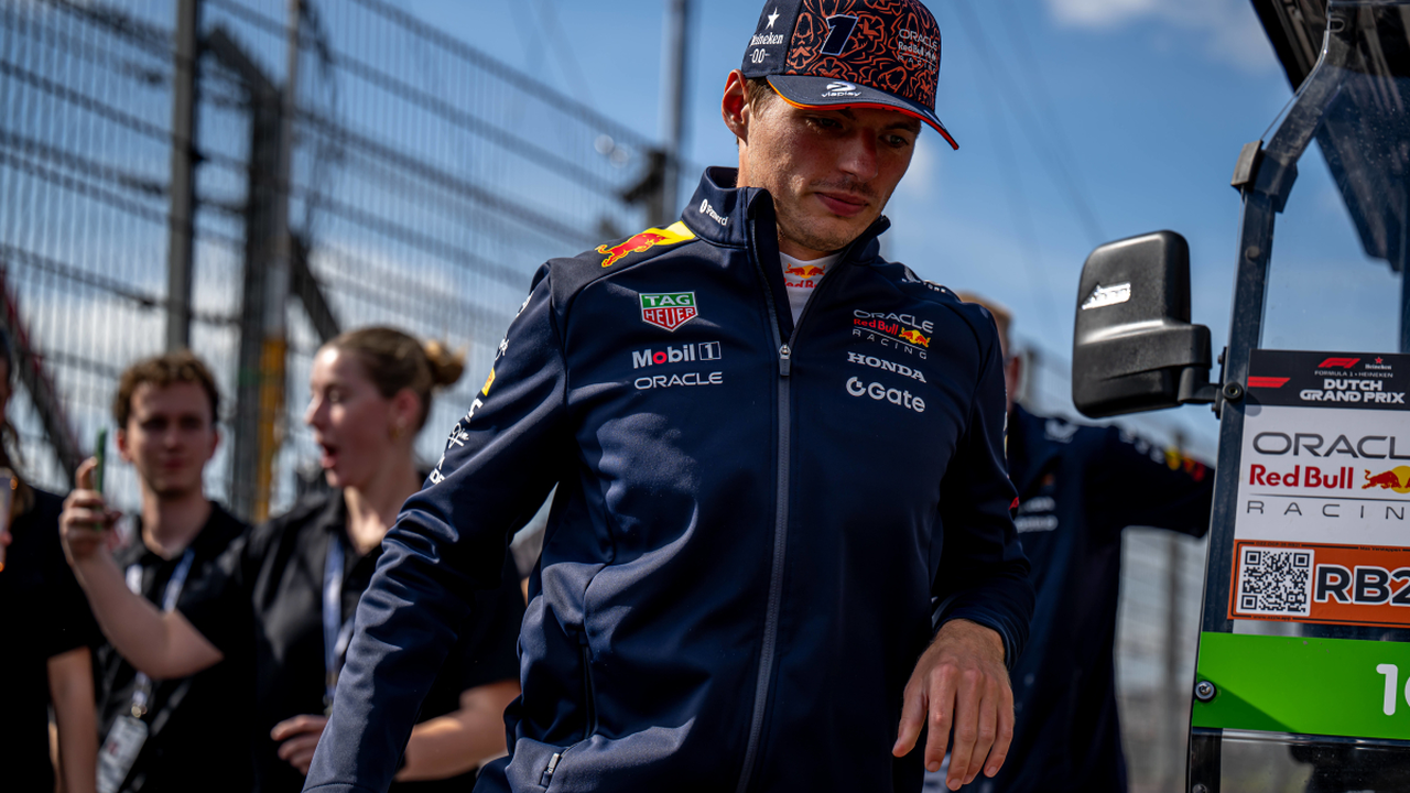Max Verstappen walks through the paddock at Zandvoort